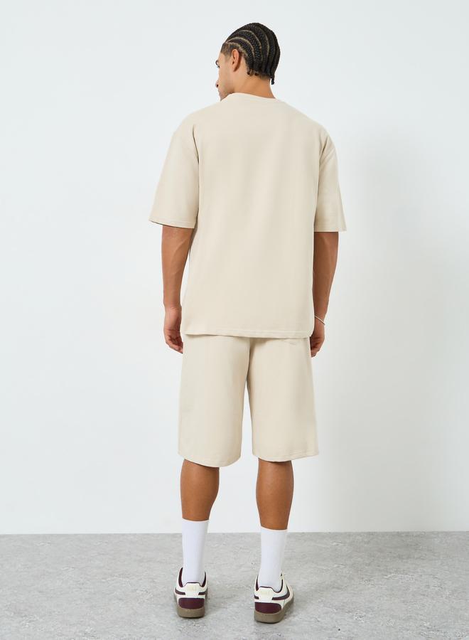 Styli Men Beige Graphic Oversized T-Shirt and Shorts Co-Ords - Image 5
